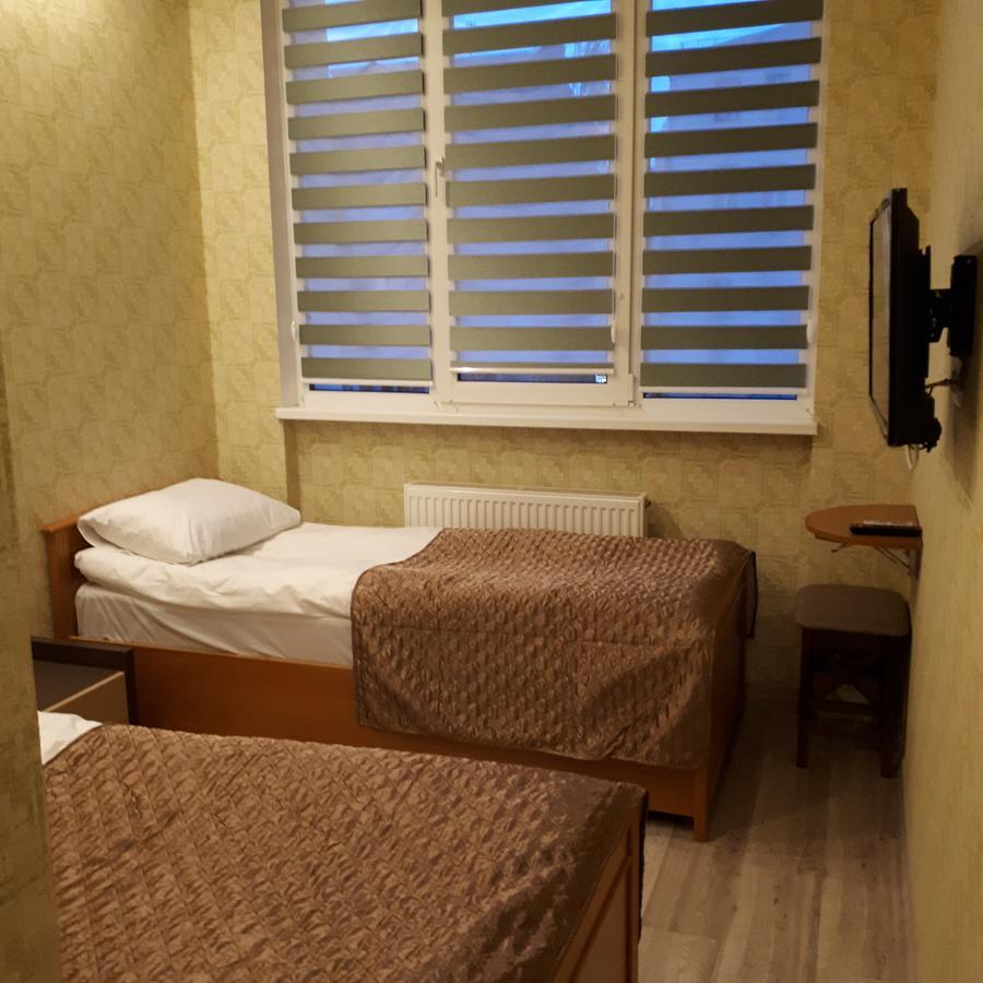 Tweepersoonskamer met 2 Aparte Bedden